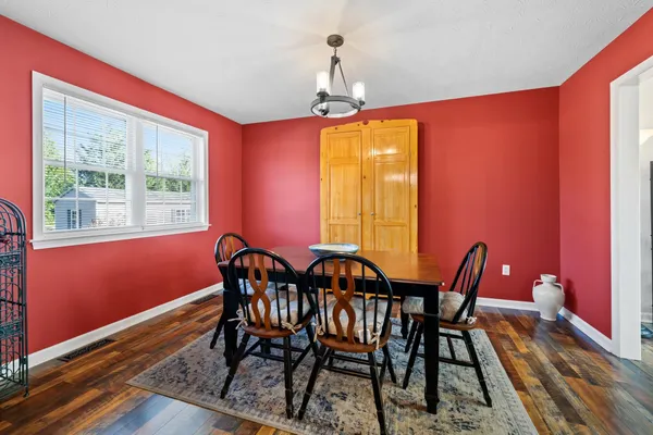a view of a balcony with wooden floor