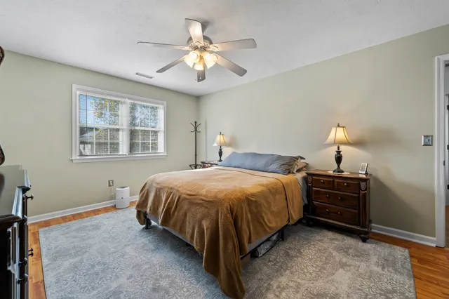 a view of a cafe with sitting area