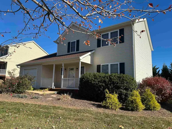 a front view of a house with a porch