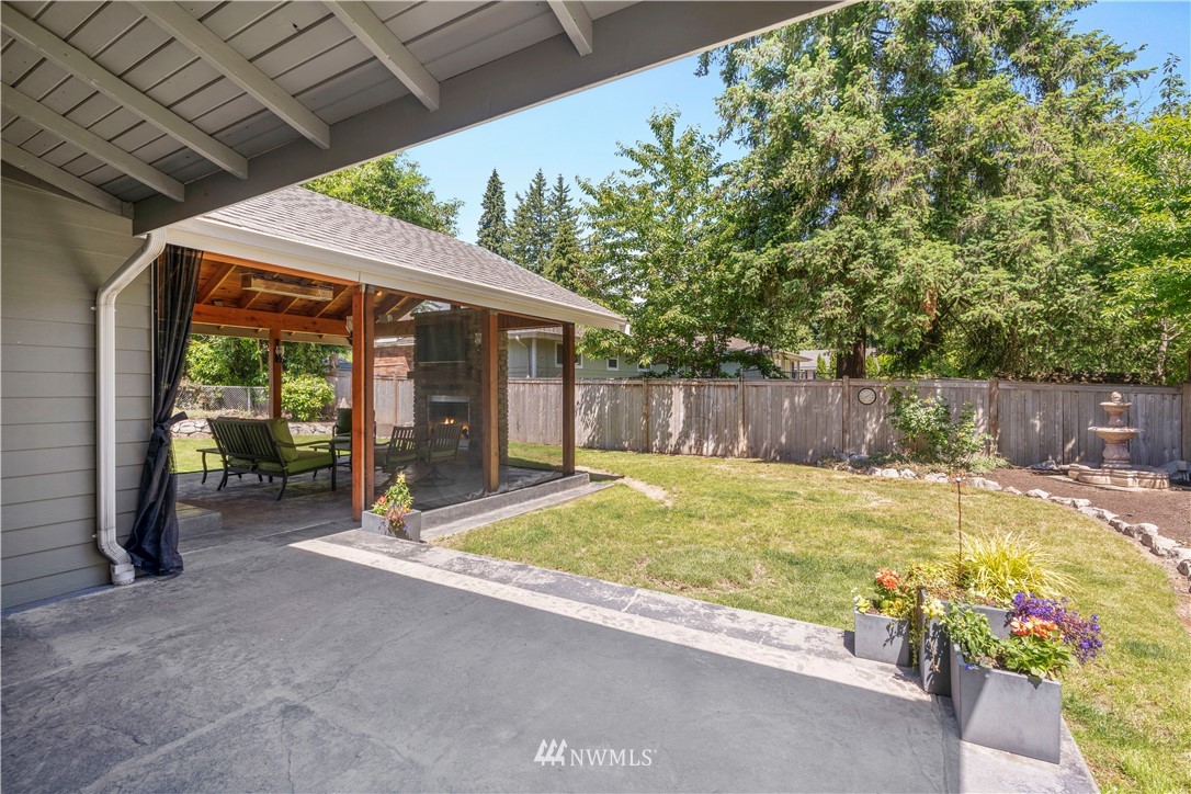 5 Winesap Road Bothell, WA 98012 - Photo 23 of 25 a swimming pool with wooden fence