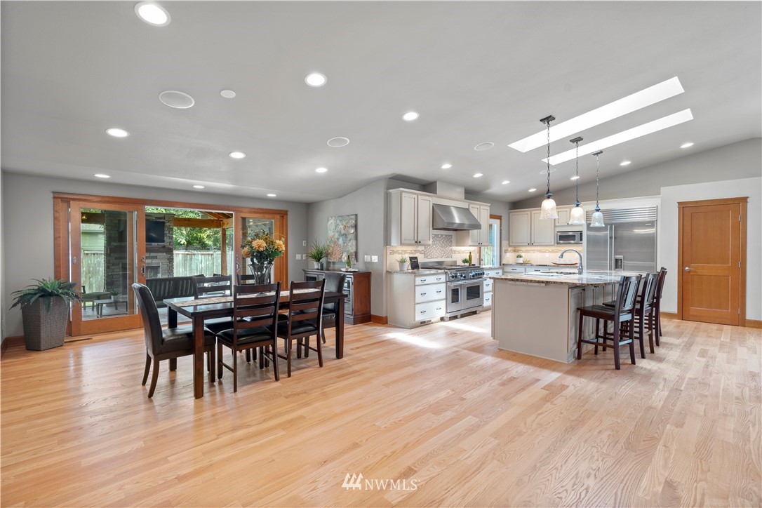 5 Winesap Road Bothell, WA 98012 - Photo 6 of 25 a view of a dining area with furniture window and wooden floor