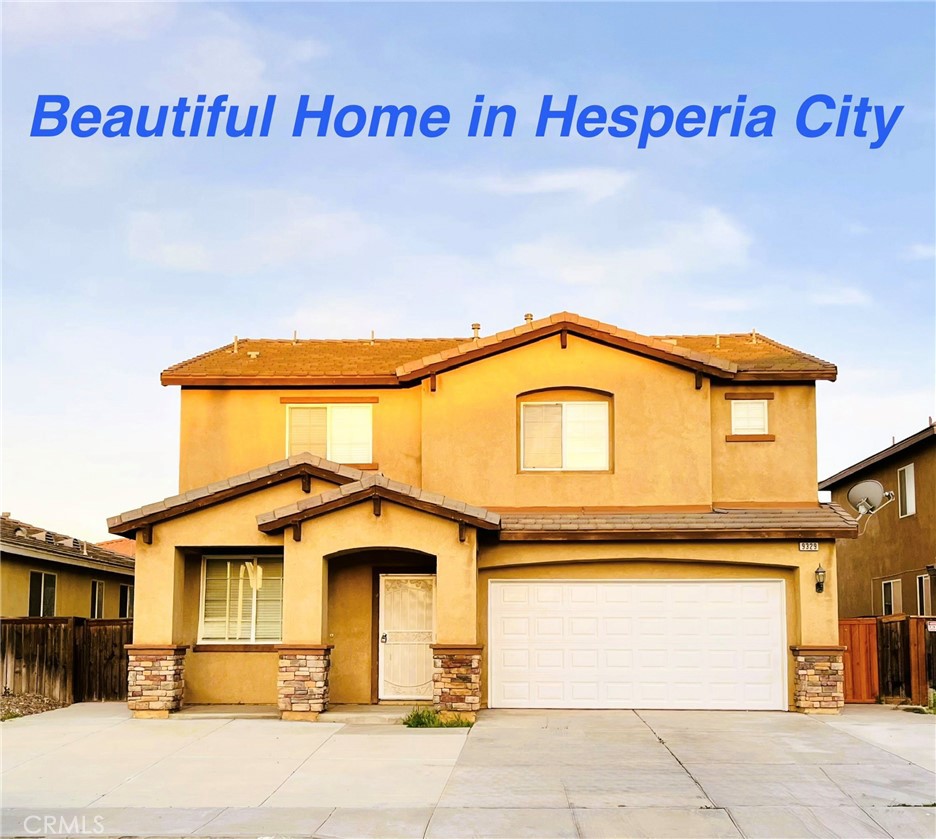 9329 Sable Ridge Avenue Hesperia, CA 92345 - Photo 1 of 31 a yellow and white house with a outdoor space