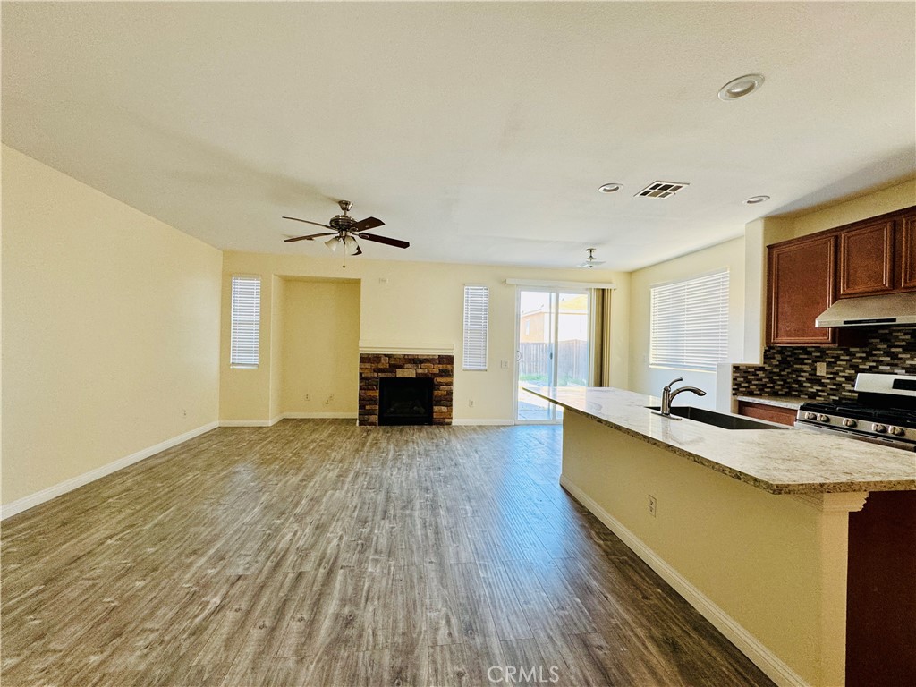 9329 Sable Ridge Avenue Hesperia, CA 92345 - Photo 12 of 31 a kitchen with sink and cabinets