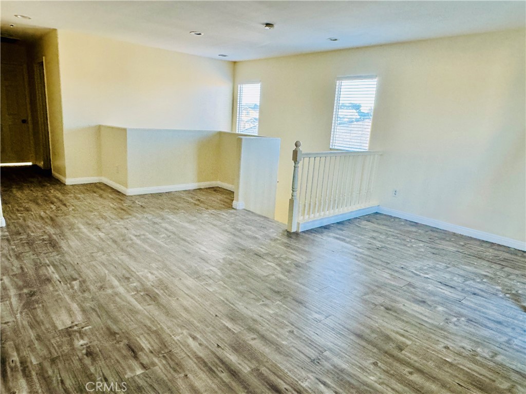 9329 Sable Ridge Avenue Hesperia, CA 92345 - Photo 21 of 31 a view of a livingroom with wooden floor