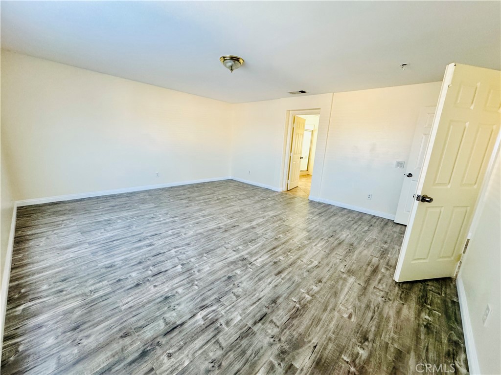 9329 Sable Ridge Avenue Hesperia, CA 92345 - Photo 23 of 31 wooden floor in an empty room