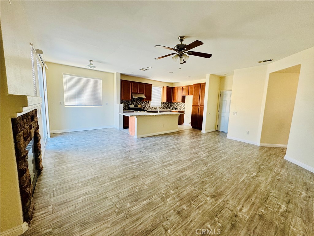 9329 Sable Ridge Avenue Hesperia, CA 92345 - Photo 5 of 31 a view of living room with furniture and flat screen tv