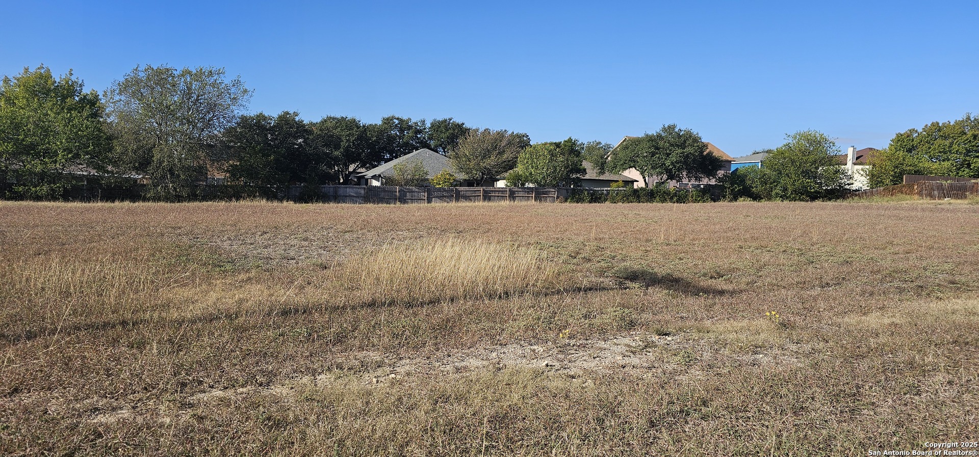 813 Toepperwein Road Converse, TX 78109 - Photo 3 of 4 a view of dirt field and trees in the background