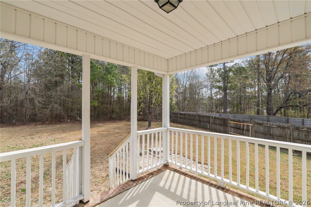 115 Shelby Street Spring Lake, NC 28390 - Photo 33 of 40 a view of a balcony with yard