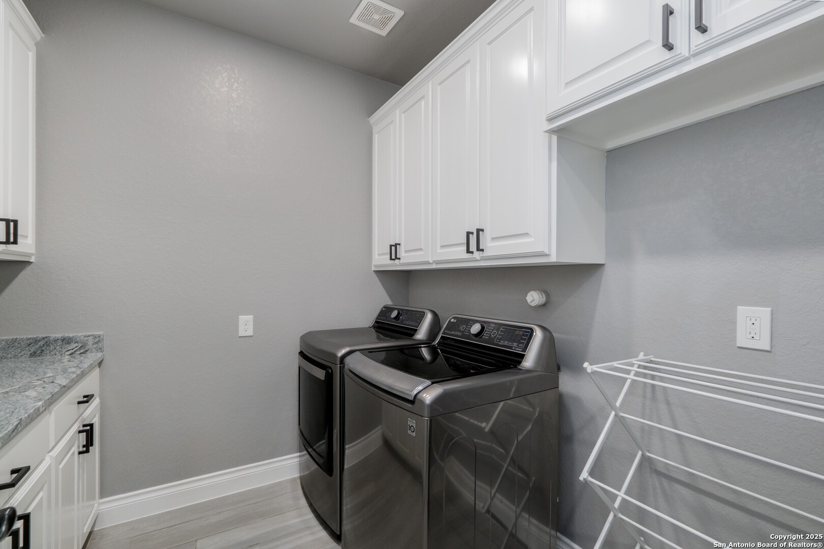 108 Timber Heights La Vernia, TX 78121 - Photo 23 of 42 a room with storage and utility