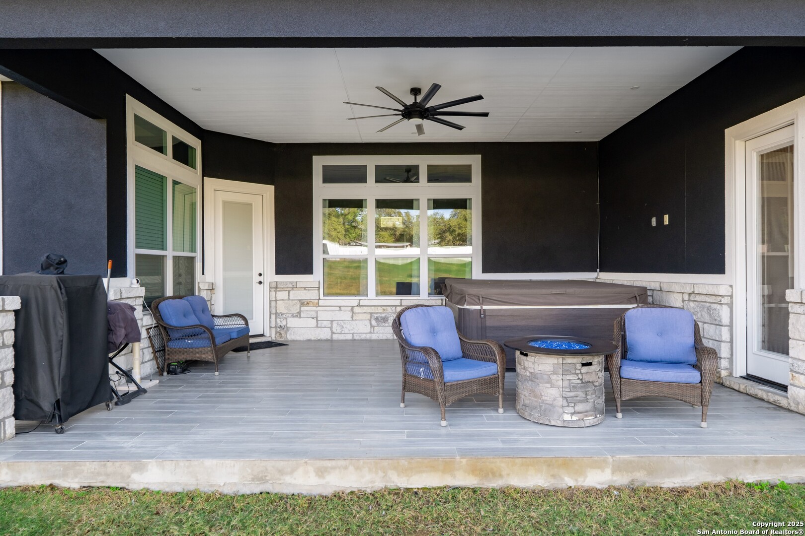 108 Timber Heights La Vernia, TX 78121 - Photo 36 of 42 a living room with furniture and a large window