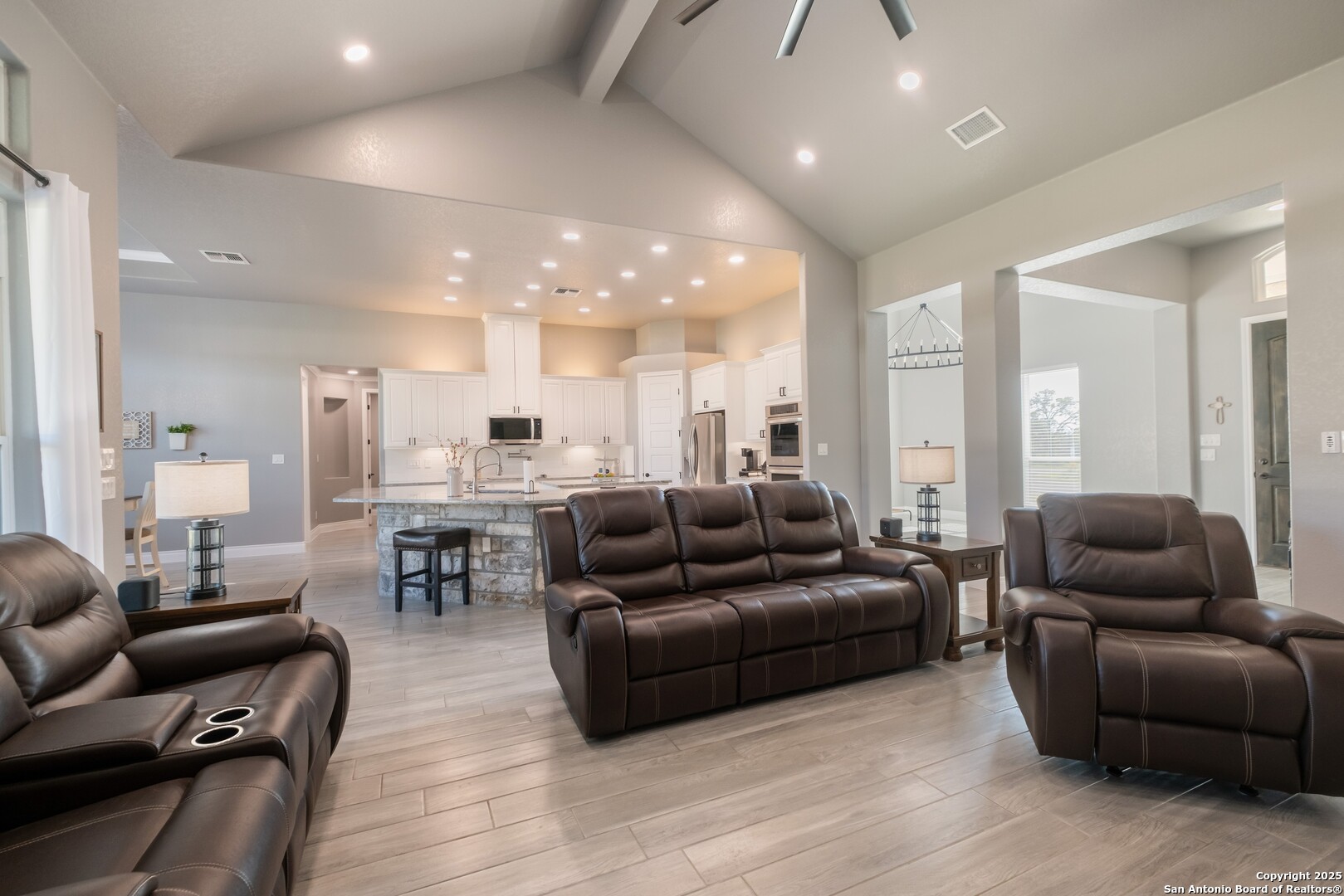 108 Timber Heights La Vernia, TX 78121 - Photo 10 of 42 a living room with furniture and a view of kitchen