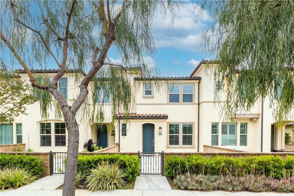 front view of a house with a garden