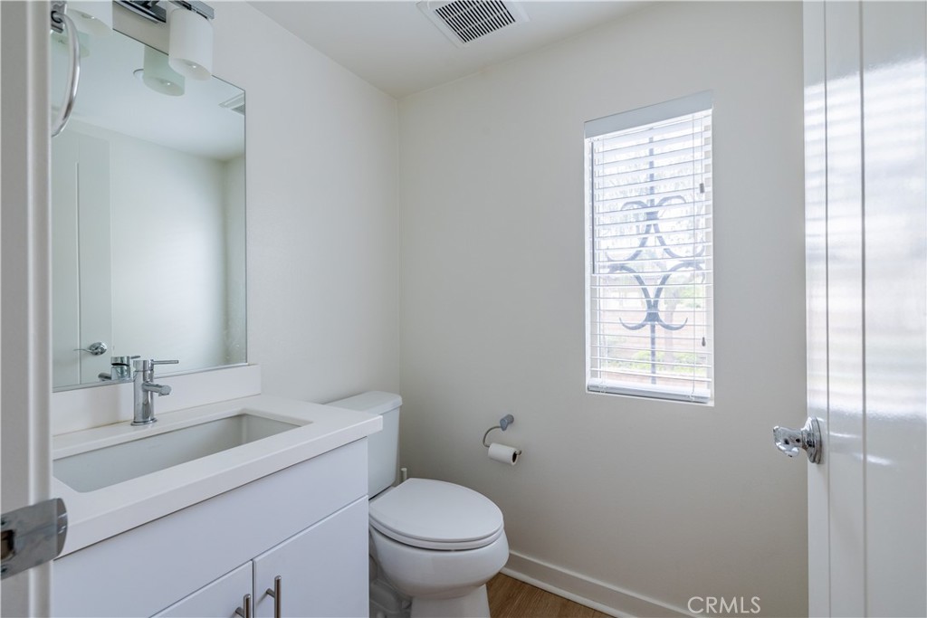 24 Prominence Lake Forest, CA 92630 - Photo 24 of 31 a bathroom with a sink and a toilet