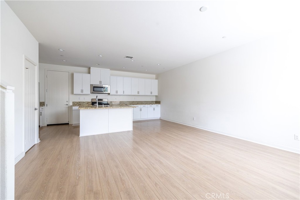 24 Prominence Lake Forest, CA 92630 - Photo 3 of 31 a view of kitchen with wooden floor