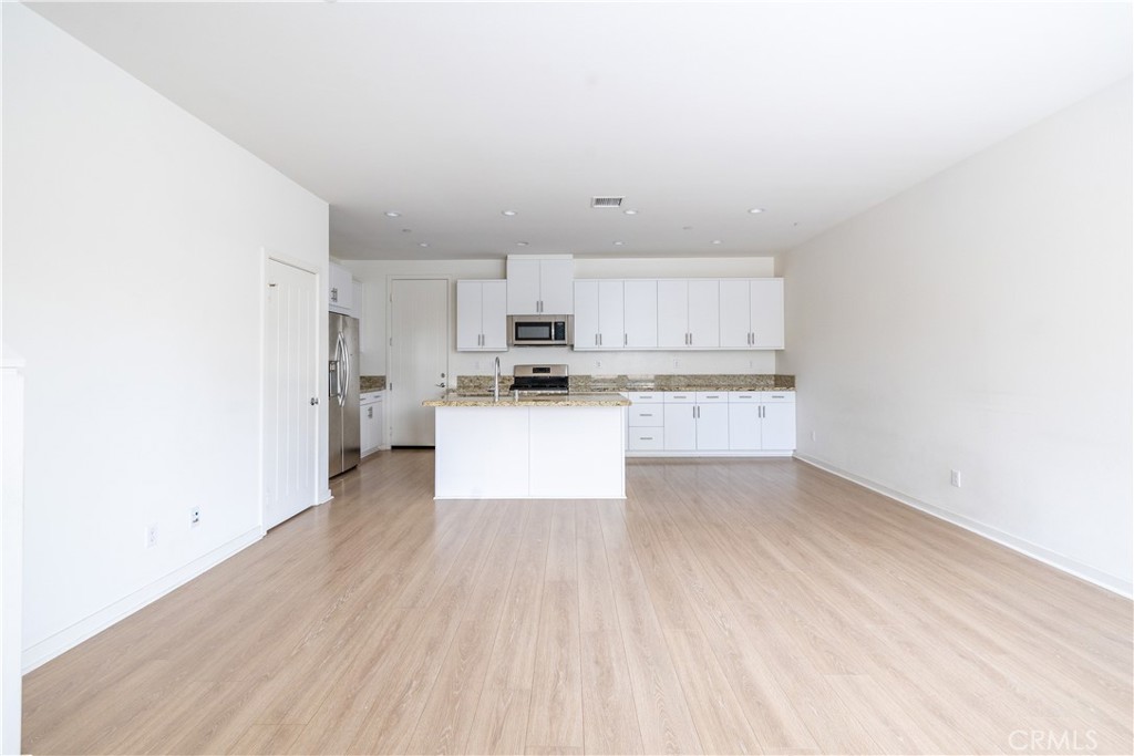 24 Prominence Lake Forest, CA 92630 - Photo 8 of 31 a view of kitchen with wooden floor