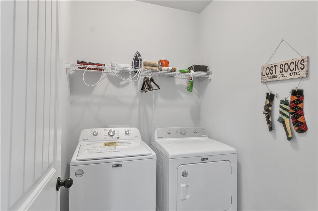 265 Valley Crossing Canton, GA 30114 - Photo 13 of 31 a utility room with dryer and washer