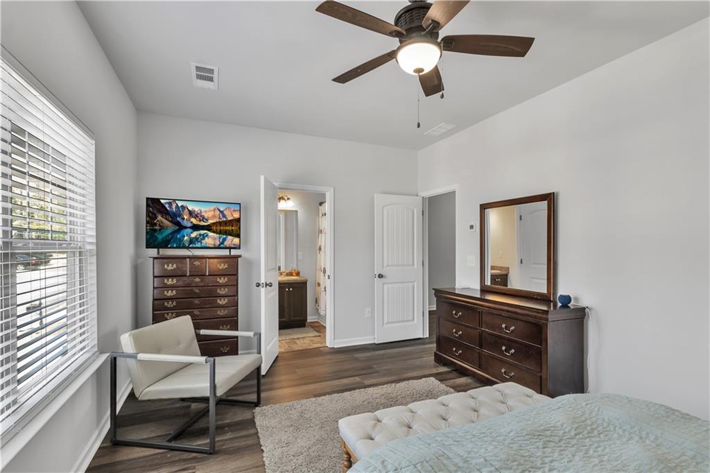 265 Valley Crossing Canton, GA 30114 - Photo 15 of 31 a living room with furniture and a flat screen tv