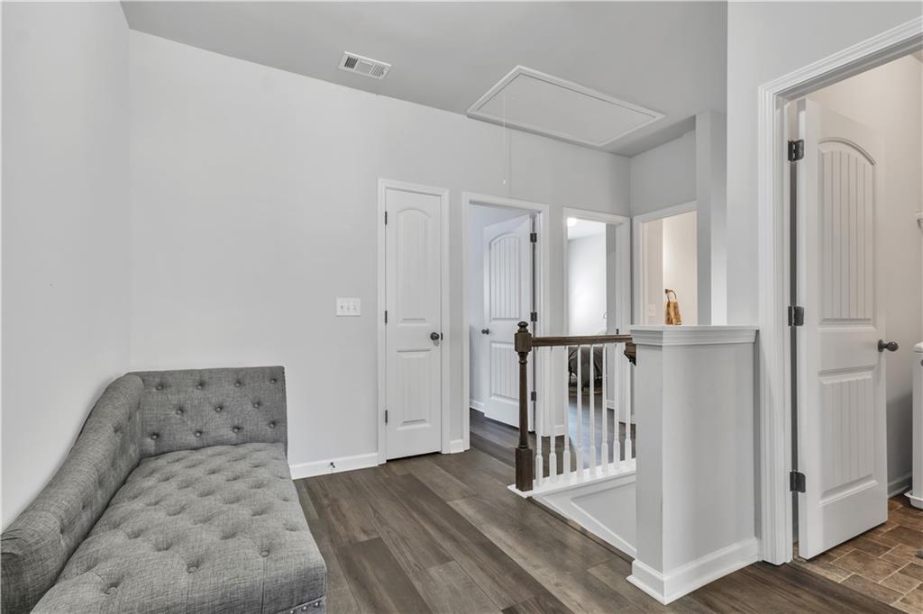 265 Valley Crossing Canton, GA 30114 - Photo 20 of 31 a view of entryway with wooden floor