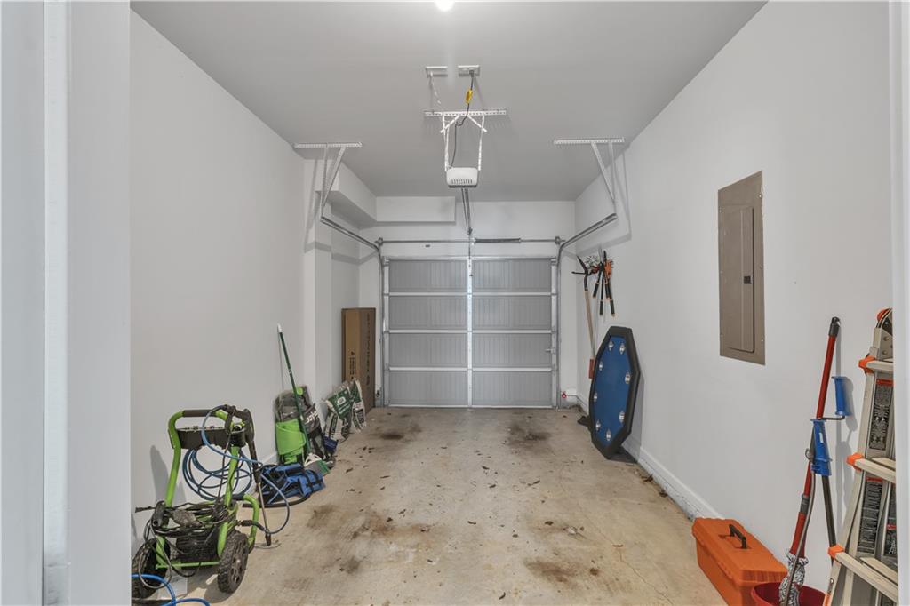 265 Valley Crossing Canton, GA 30114 - Photo 25 of 31 a view of a livingroom with storage & utility room