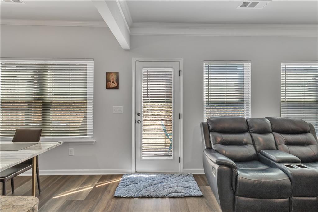 265 Valley Crossing Canton, GA 30114 - Photo 26 of 31 a living room with furniture and a window