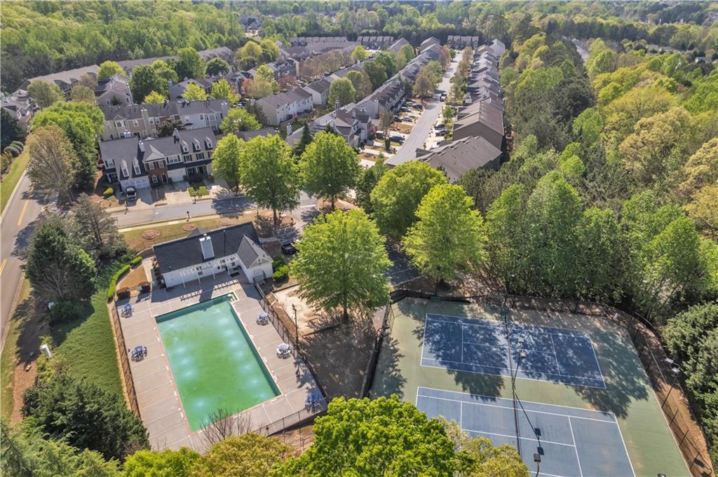 265 Valley Crossing Canton, GA 30114 - Photo 5 of 31 a aerial view of a house with a yard and large trees