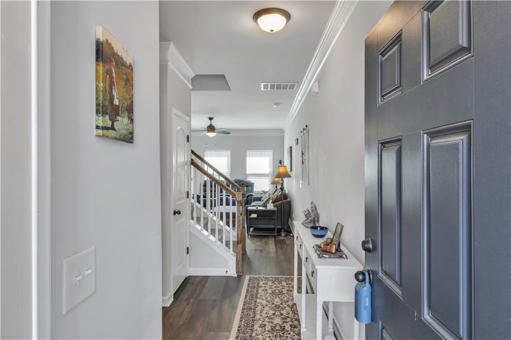 265 Valley Crossing Canton, GA 30114 - Photo 7 of 31 a view of entryway and hall with a dining room