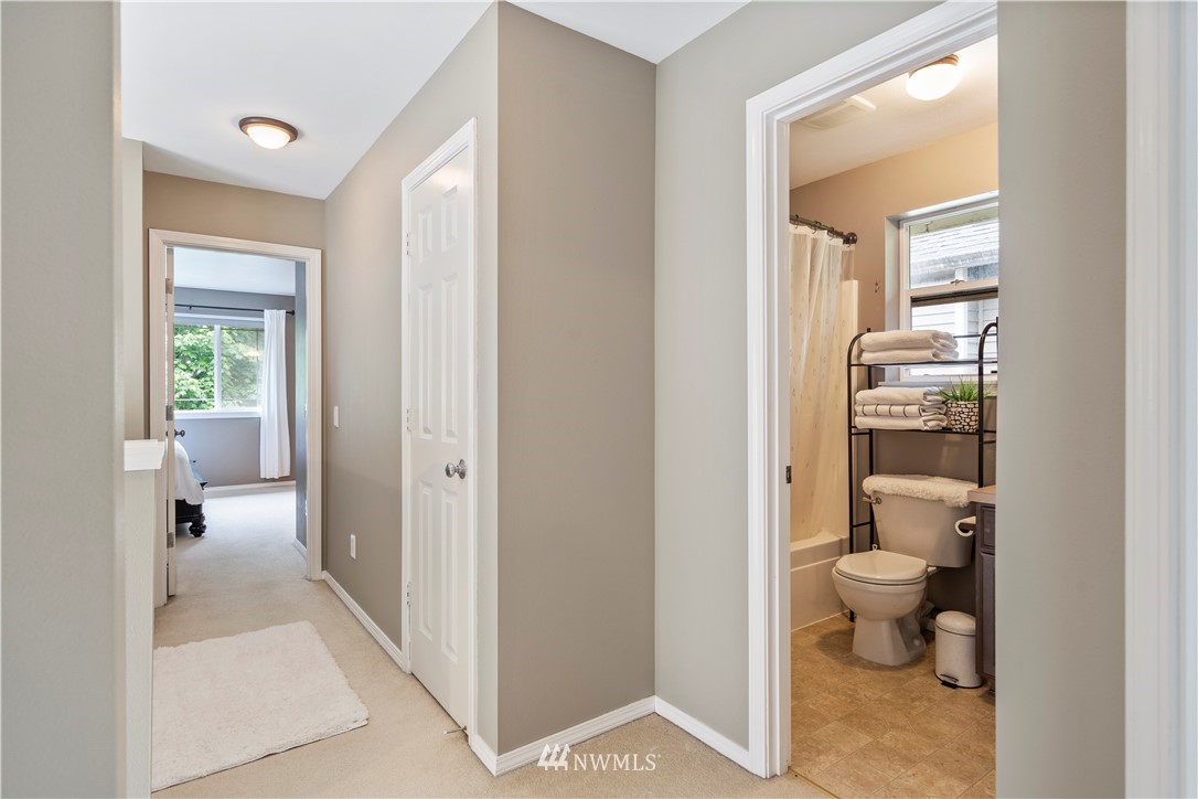 1162 Edmonds Place Northeast Renton, WA 98056 - Photo 24 of 25 a bathroom with a toilet and a view of bathroom