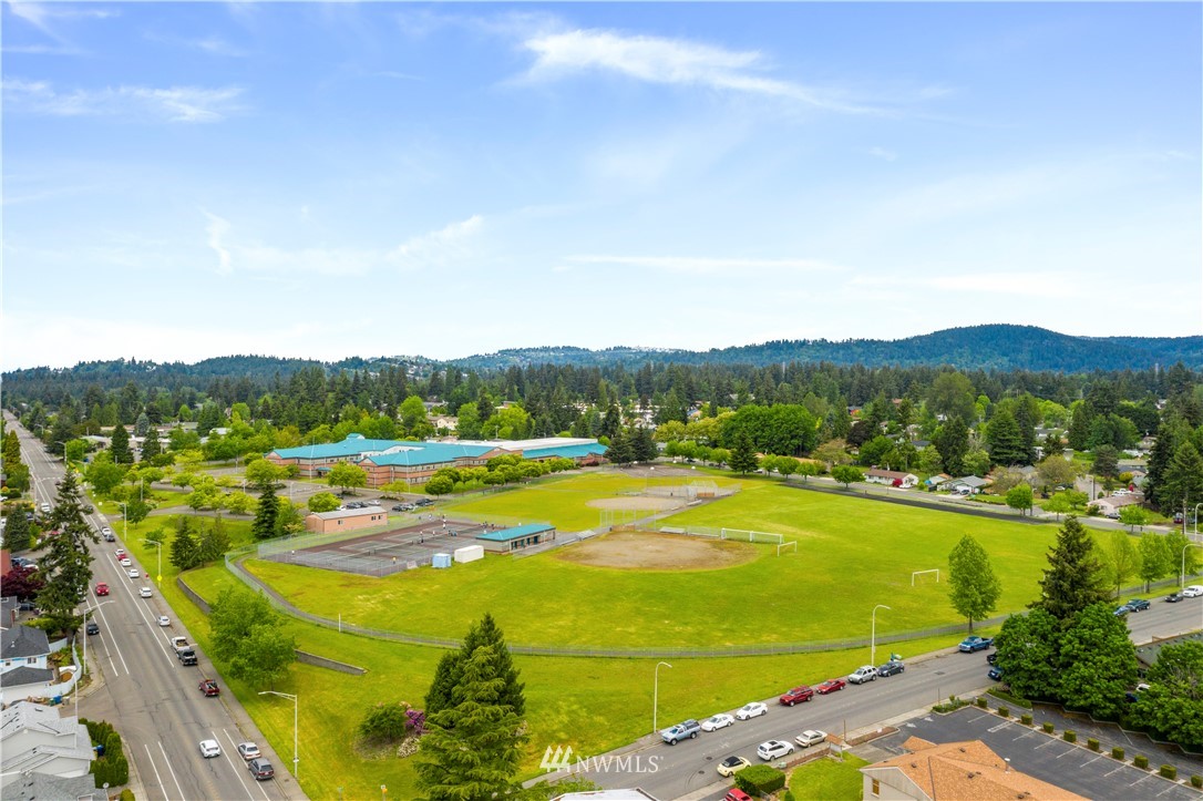 1162 Edmonds Place Northeast Renton, WA 98056 - Photo 6 of 25 a view of a city with an ocean beach