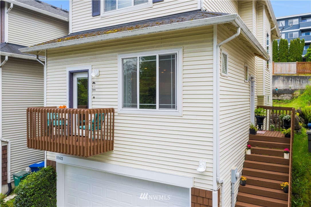 1162 Edmonds Place Northeast Renton, WA 98056 - Photo 9 of 25 a view of a house with a deck