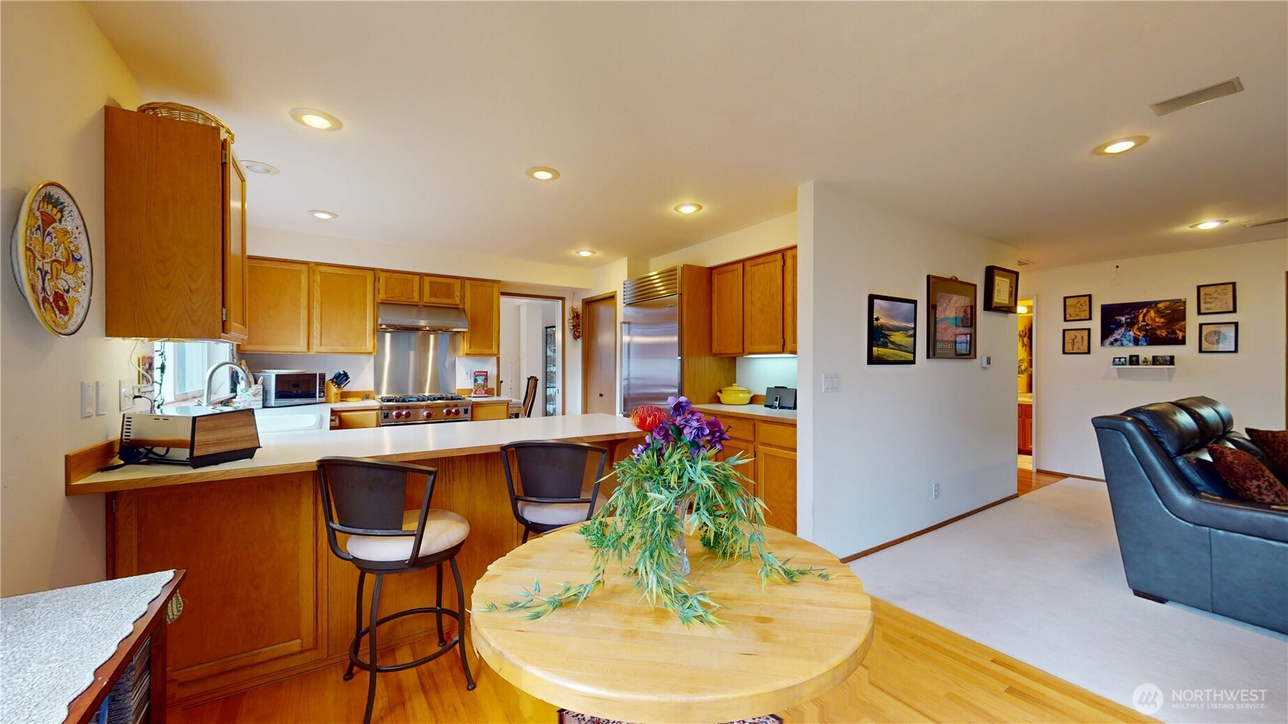 1704 Field Place Northeast Renton, WA 98059 - Photo 12 of 38 a view of a dining room with furniture window and wooden floor