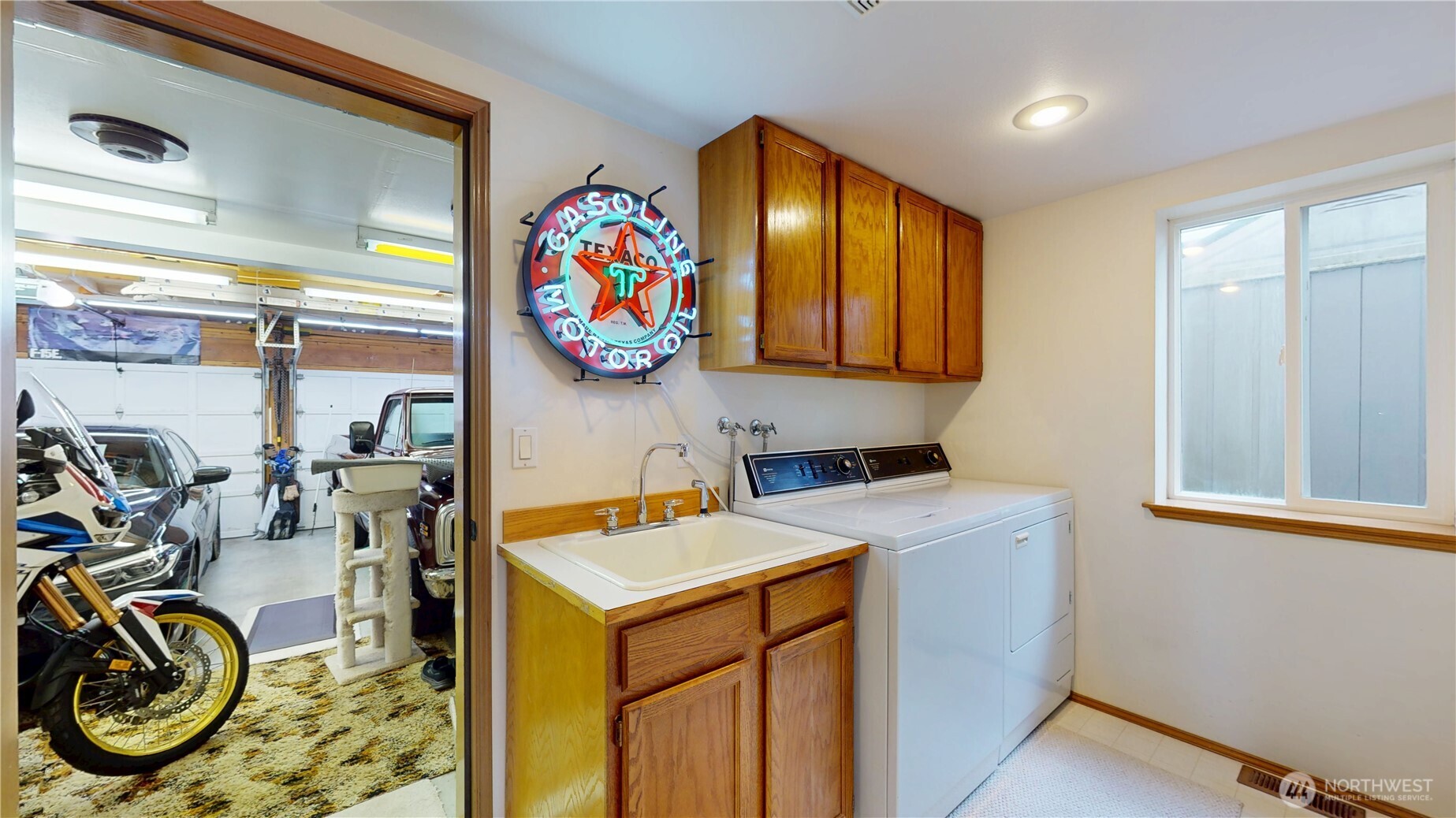 1704 Field Place Northeast Renton, WA 98059 - Photo 16 of 38 a storage room with washer and dryer