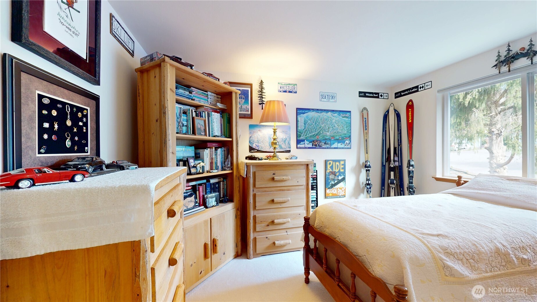 1704 Field Place Northeast Renton, WA 98059 - Photo 23 of 38 a bedroom with a bed and a book shelf