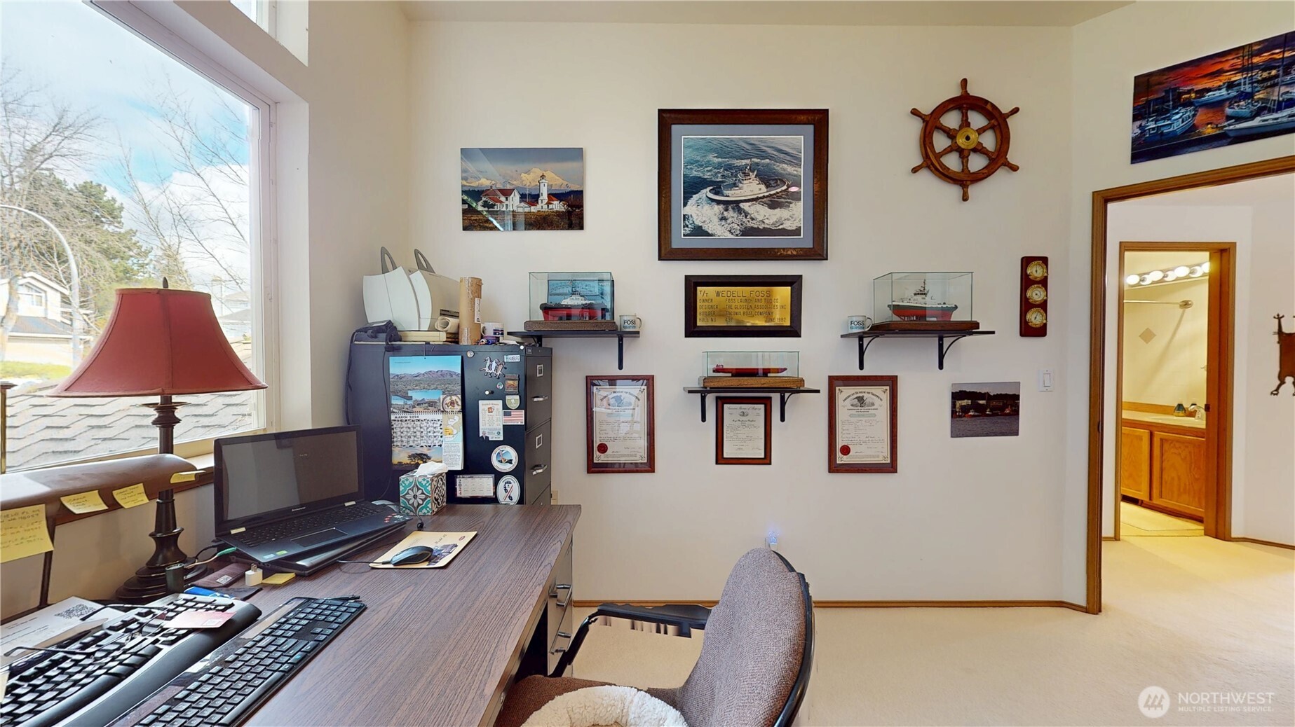 1704 Field Place Northeast Renton, WA 98059 - Photo 25 of 38 a living room with furniture and a flat screen tv