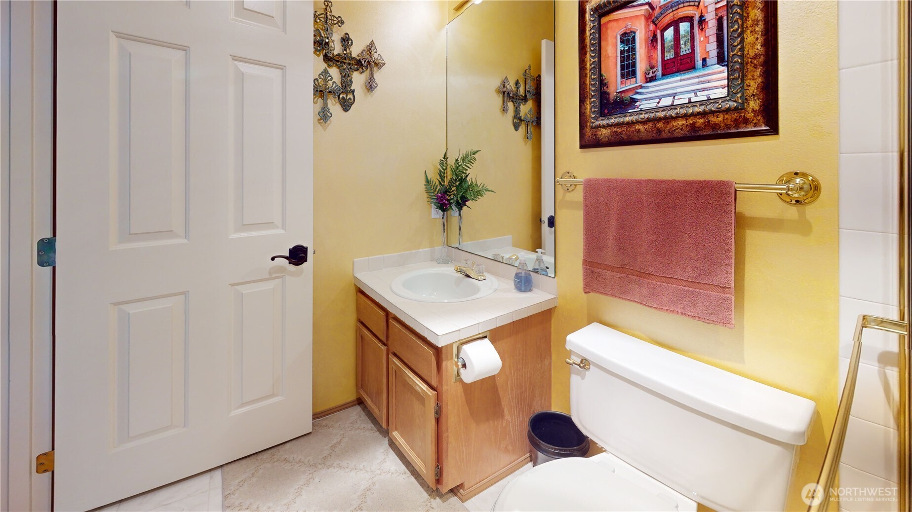 1704 Field Place Northeast Renton, WA 98059 - Photo 29 of 38 a bathroom with a sink and a mirror