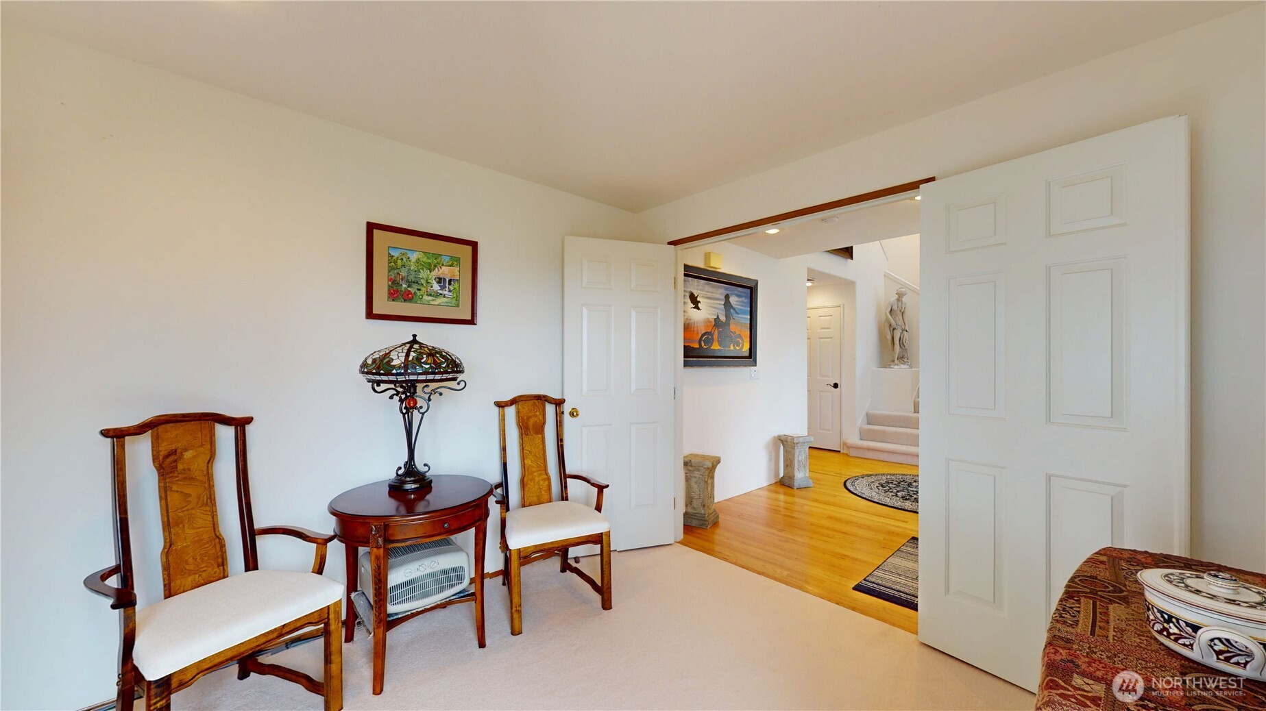 1704 Field Place Northeast Renton, WA 98059 - Photo 5 of 38 a view of a bedroom with furniture and wooden floor