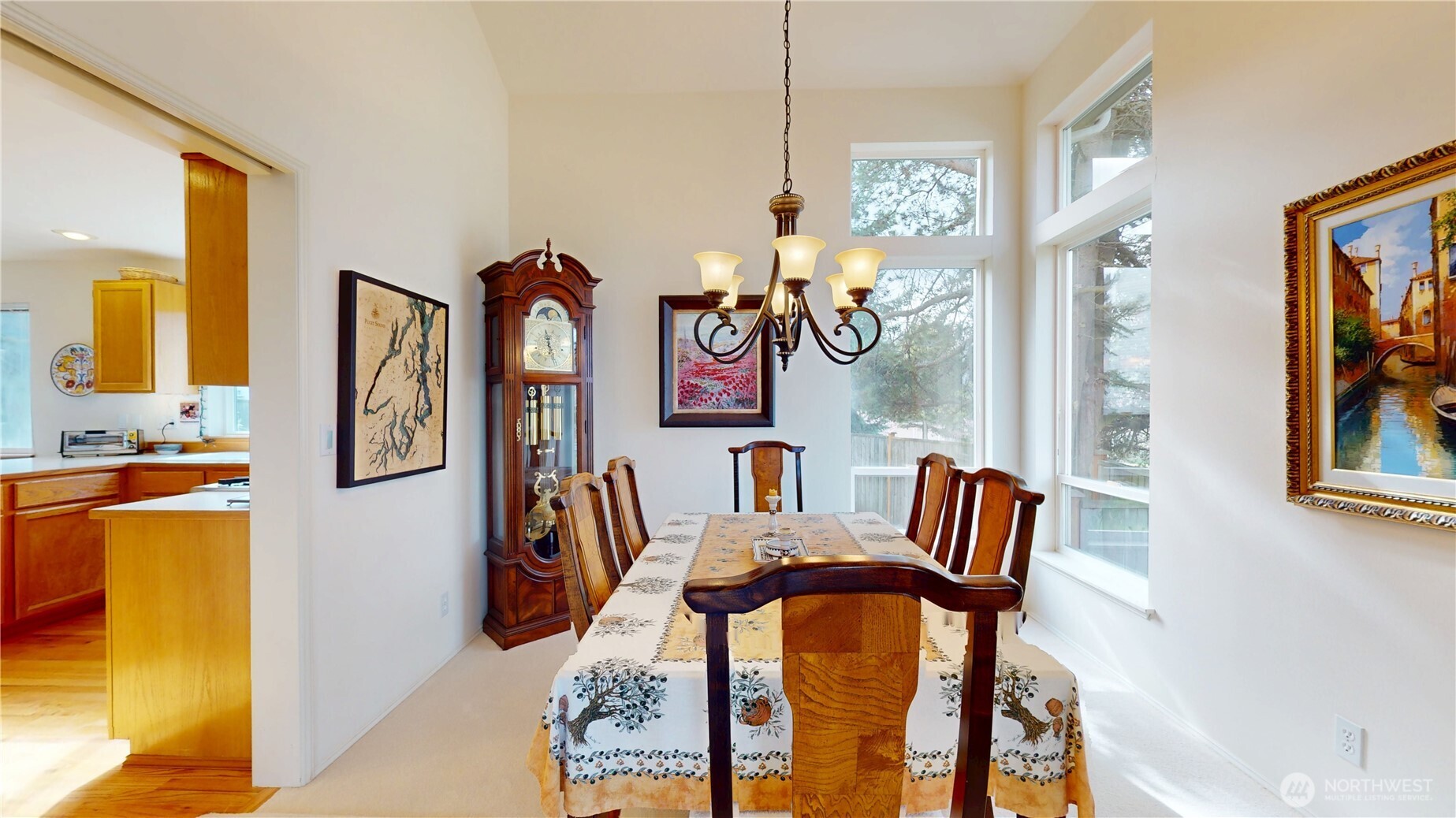 1704 Field Place Northeast Renton, WA 98059 - Photo 8 of 38 a view of a dining room with furniture and chandelier