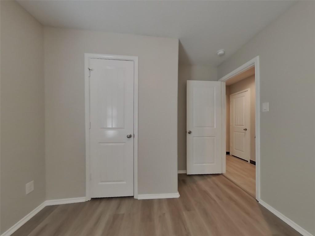 8523 Aster Glen Way Rosharon, TX 77583 - Photo 13 of 15 a view of a livingroom with wooden floor
