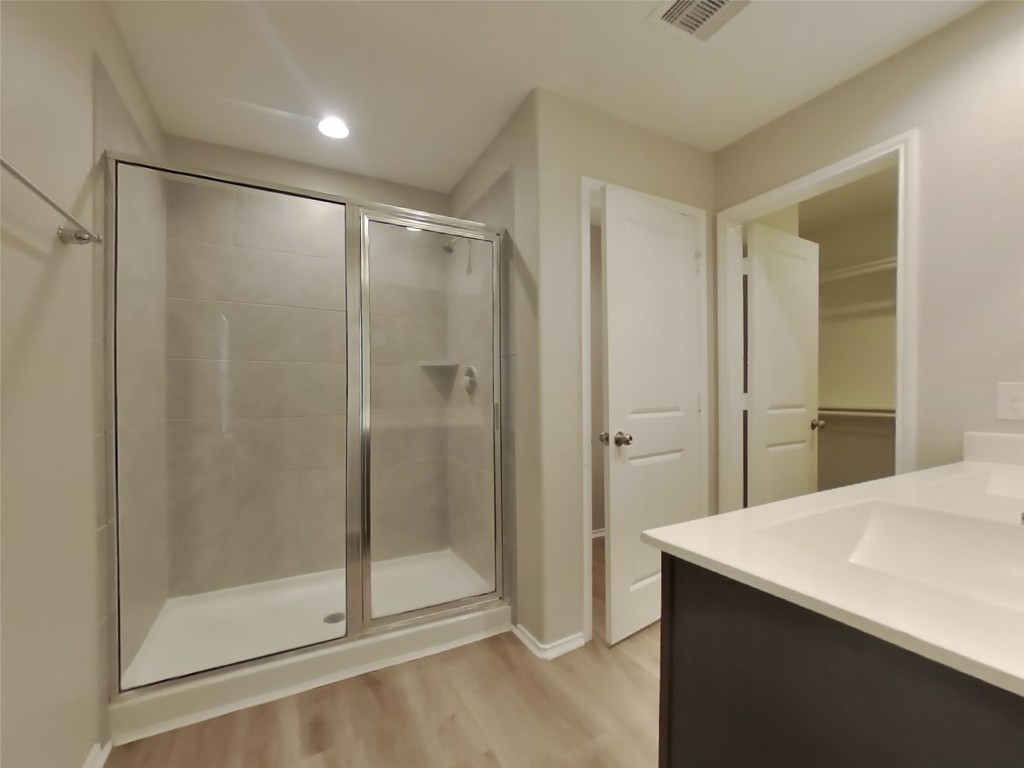 8523 Aster Glen Way Rosharon, TX 77583 - Photo 10 of 15 a bathroom with a shower and a mirror