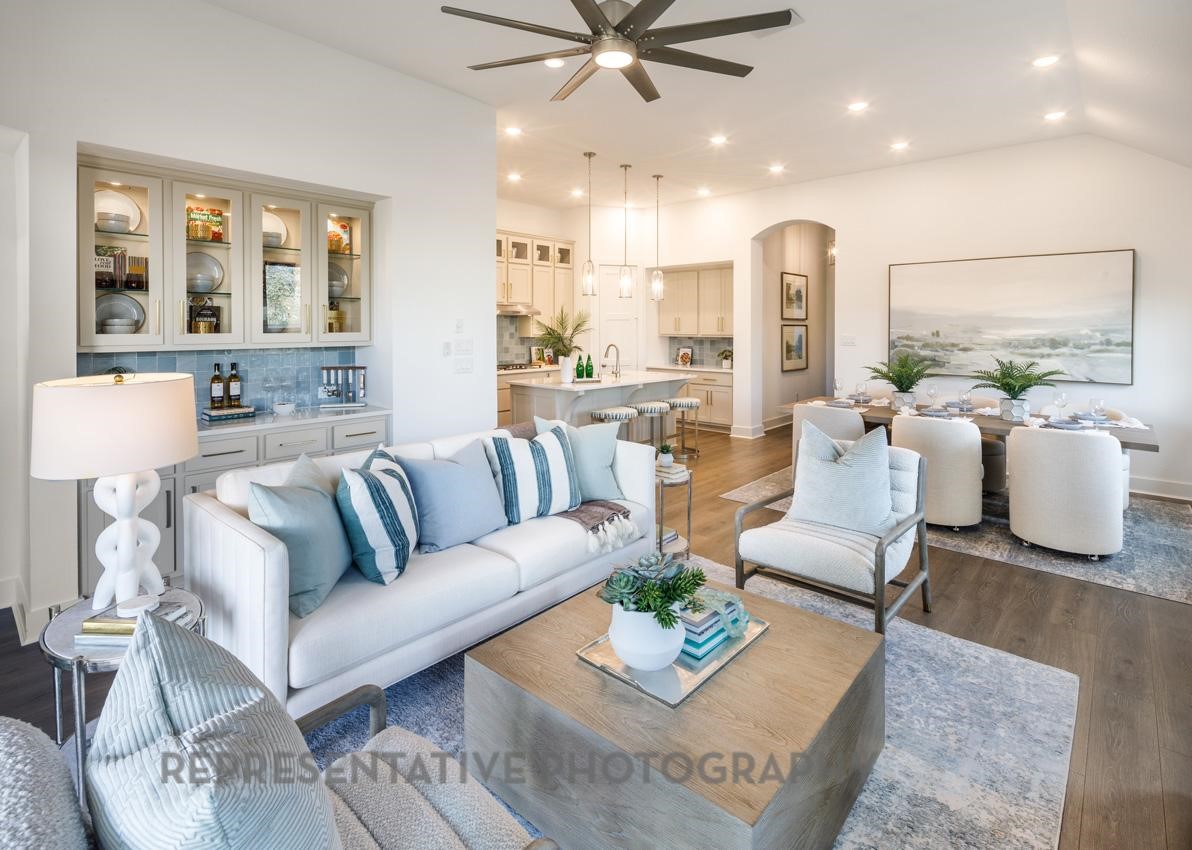 13048 Wandering Rdg Lane Conroe, TX 77302 - Photo 3 of 49 a living room with furniture and a large window