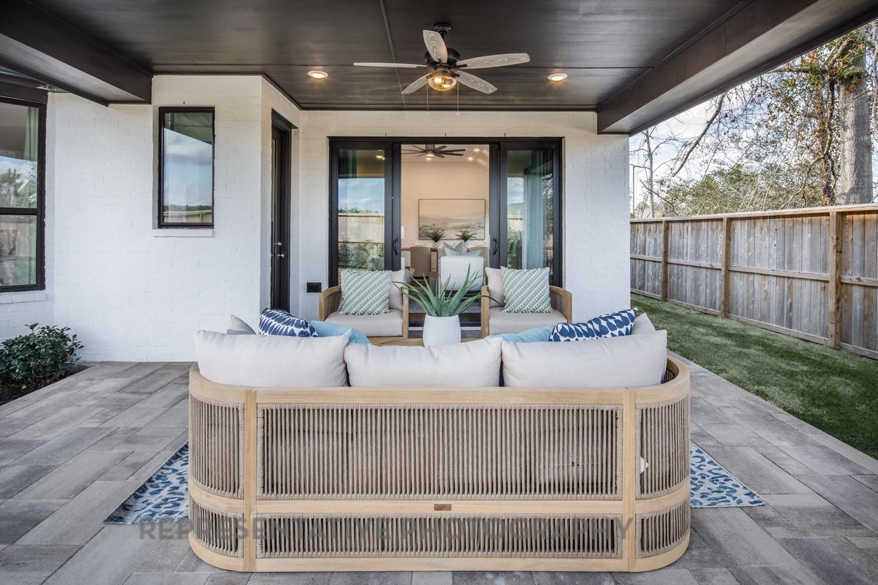 13048 Wandering Rdg Lane Conroe, TX 77302 - Photo 33 of 49 a view of living room kitchen with furniture and wooden floor