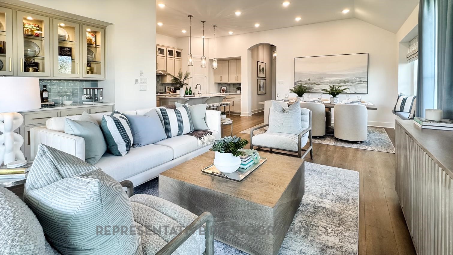 13048 Wandering Rdg Lane Conroe, TX 77302 - Photo 9 of 49 a living room with furniture kitchen view and a large window