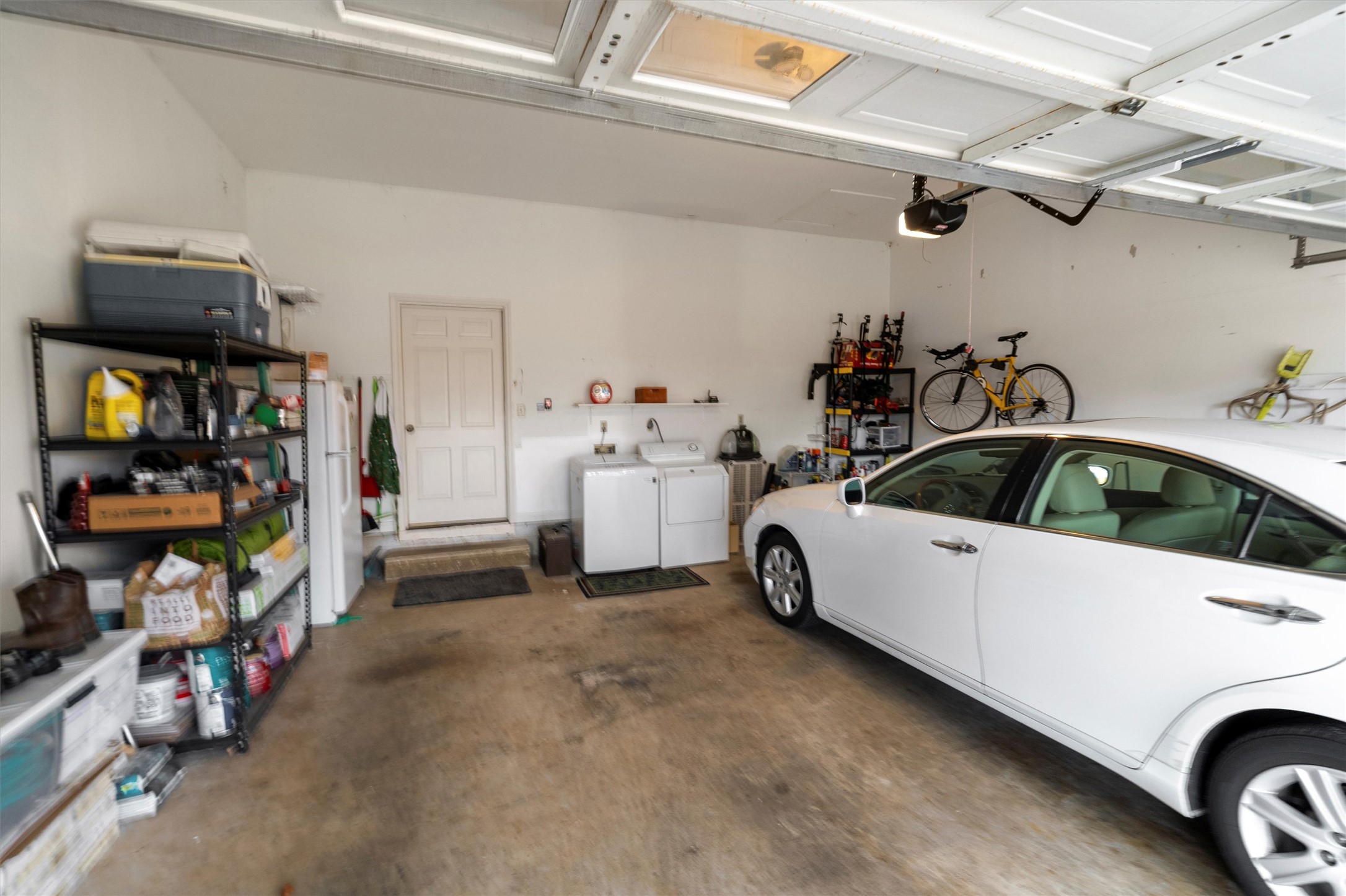 11003 Pinehurst Drive, Unit 6 Austin, TX 78747 - Photo 27 of 30 a view of car garage