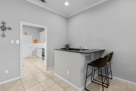 a view of a workspace with furniture