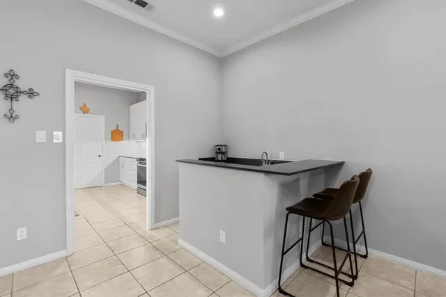 a view of a workspace with furniture