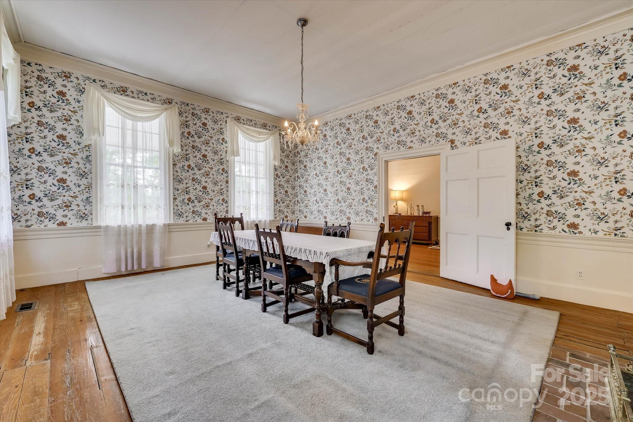 621 Meeting Street Road Edgefield, SC 29824 - Photo 11 of 40 a view of a dining room with furniture and window