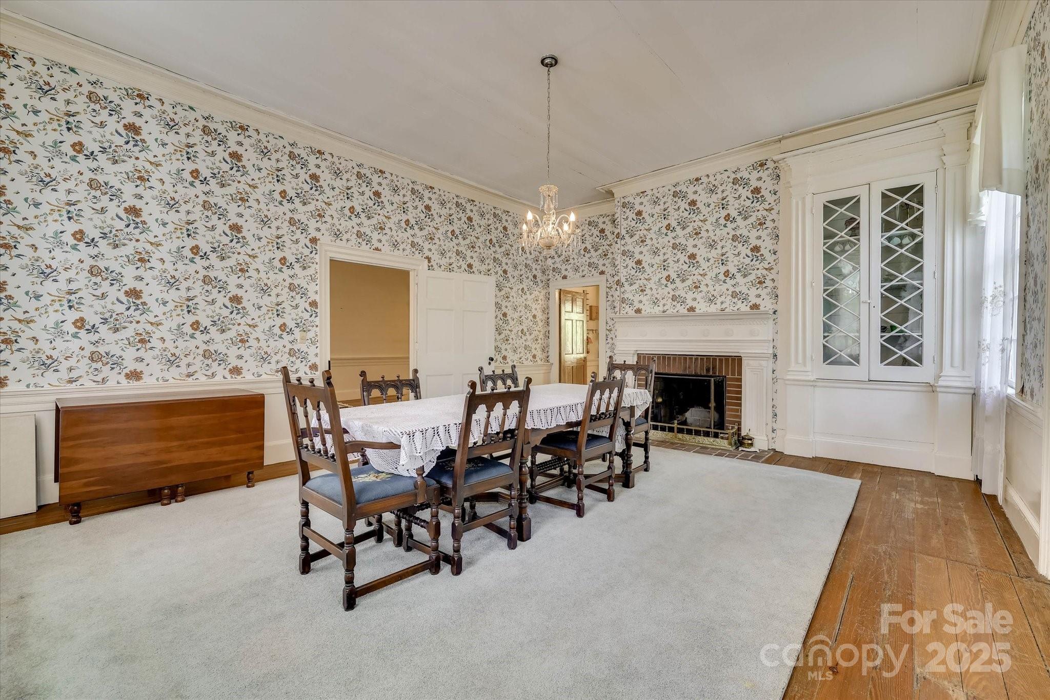 621 Meeting Street Road Edgefield, SC 29824 - Photo 12 of 40 a view of a livingroom with furniture and a fireplace