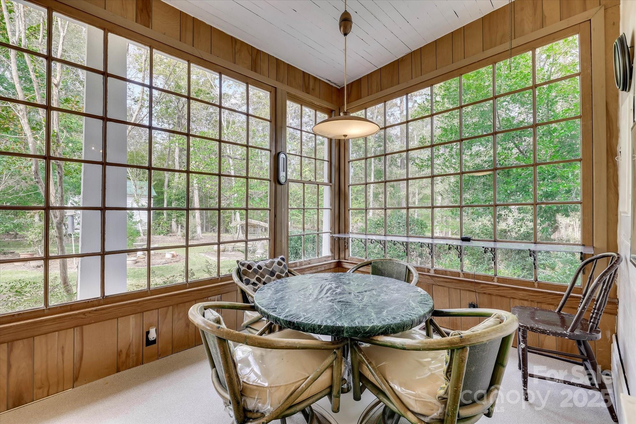621 Meeting Street Road Edgefield, SC 29824 - Photo 17 of 40 a view of a dining room with furniture window and outside view