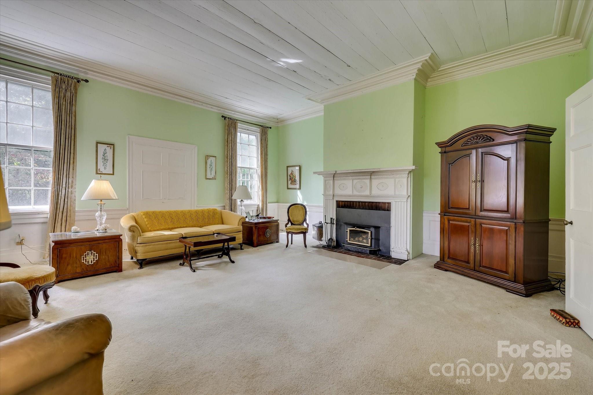 621 Meeting Street Road Edgefield, SC 29824 - Photo 21 of 40 a living room with furniture and a fireplace