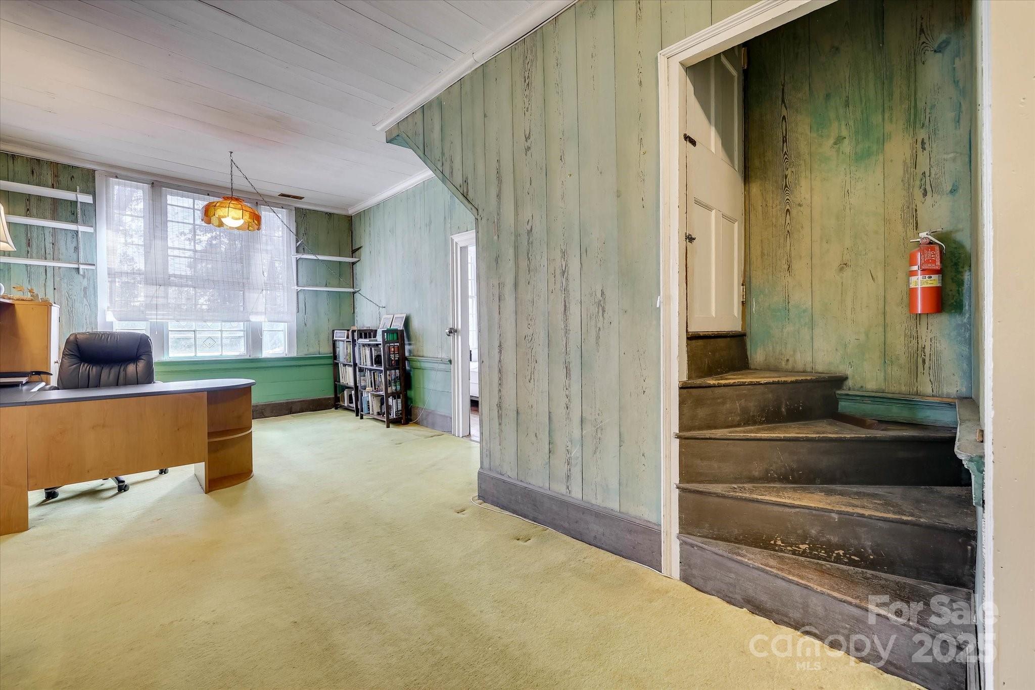 621 Meeting Street Road Edgefield, SC 29824 - Photo 24 of 40 a view of hallway with livingroom and stairs