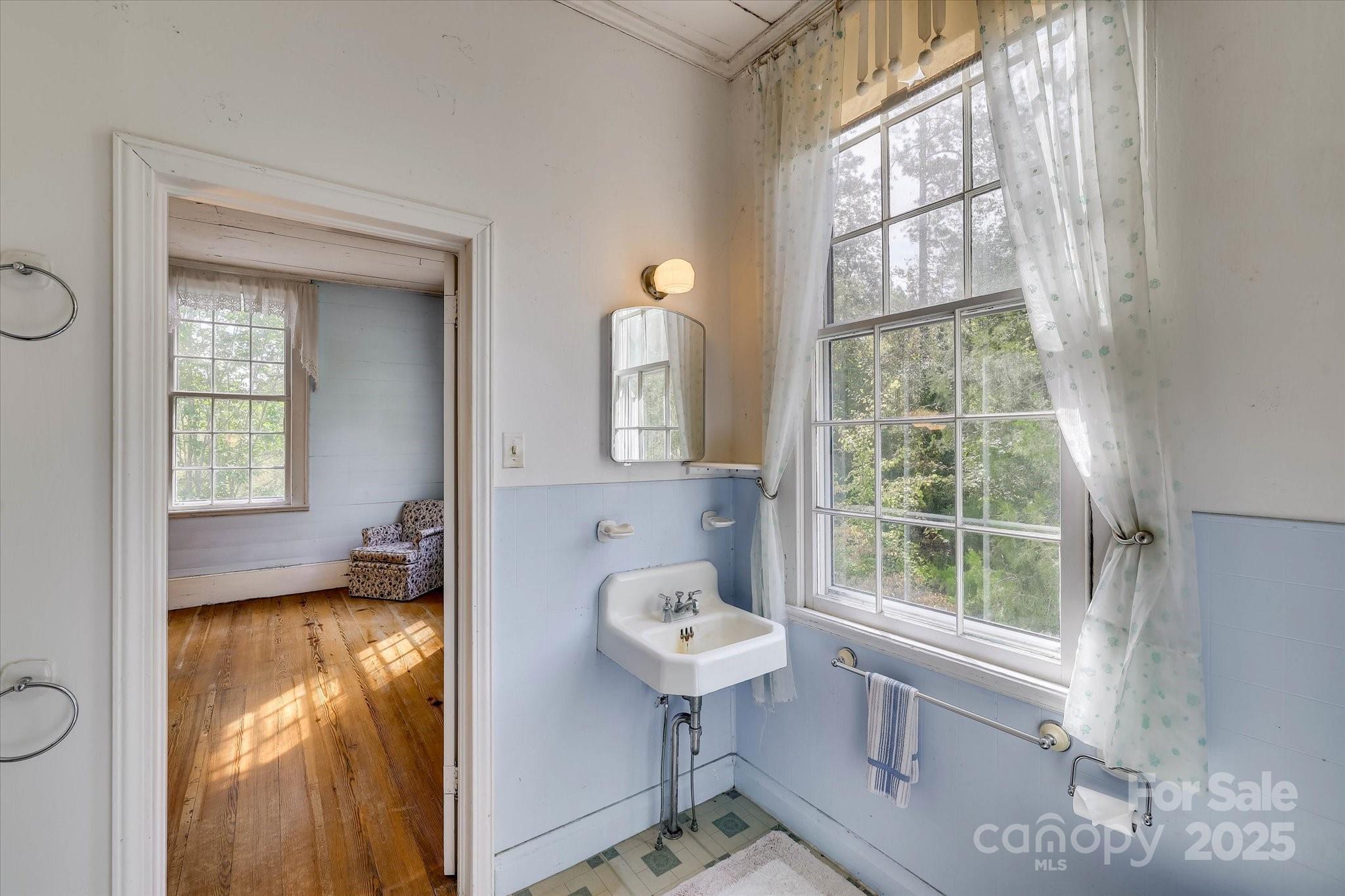 621 Meeting Street Road Edgefield, SC 29824 - Photo 27 of 40 a view of a livingroom with wooden floor and a window